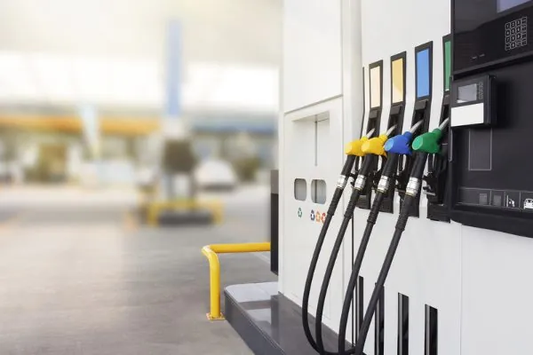 Fuel pump nozzles at a gas station